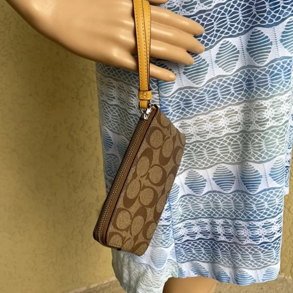 COACH Signature PVC Leather Corner Zip Wristlet